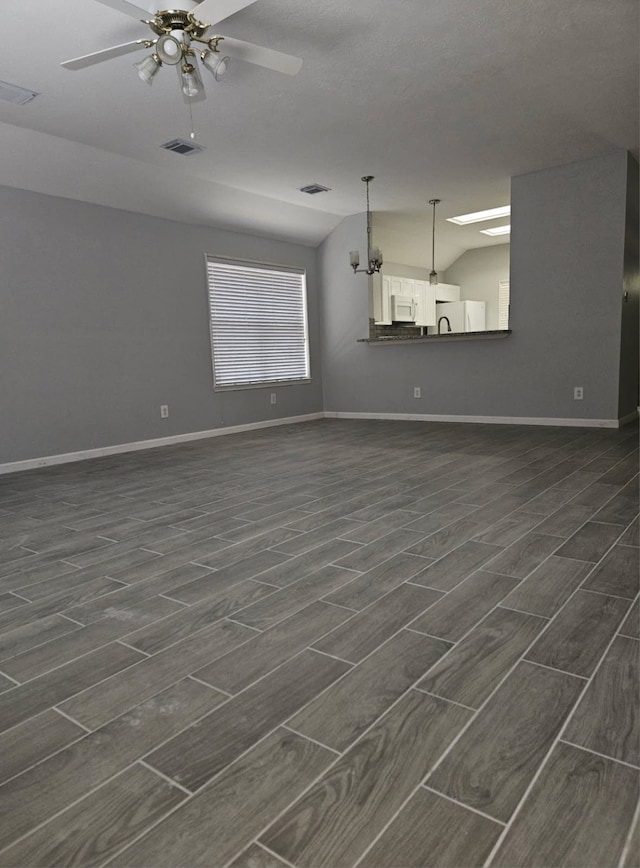 7022 Meadow Hawk Ct, Houston, TX 77041 - unfurnished living room featuring a ceiling fan, dark wood-type flooring, and vaulted ceiling