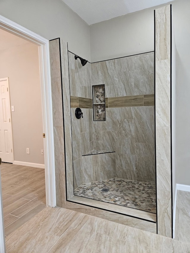 7022 Meadow Hawk Ct, Houston, TX 77041 - full bath with tiled shower and wood finished floors