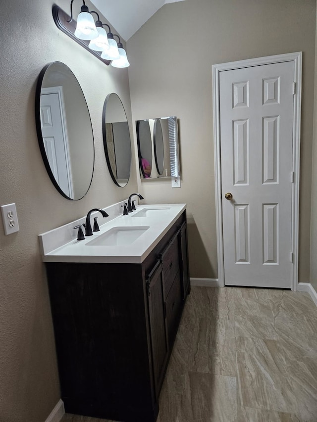 7022 Meadow Hawk Ct, Houston, TX 77041 - full bath featuring double vanity, vaulted ceiling, and marble look tile flooring