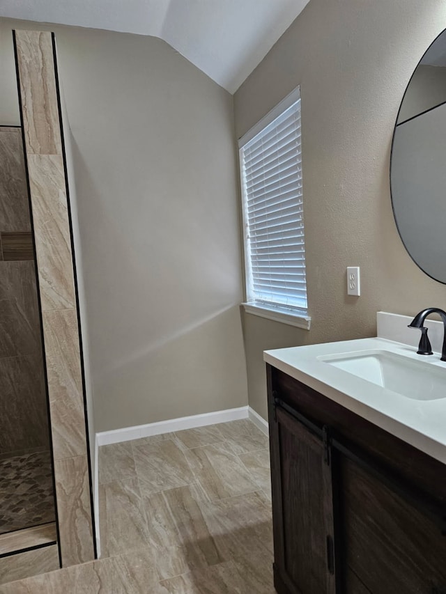 7022 Meadow Hawk Ct, Houston, TX 77041 - full bathroom with vanity, lofted ceiling, and tiled shower
