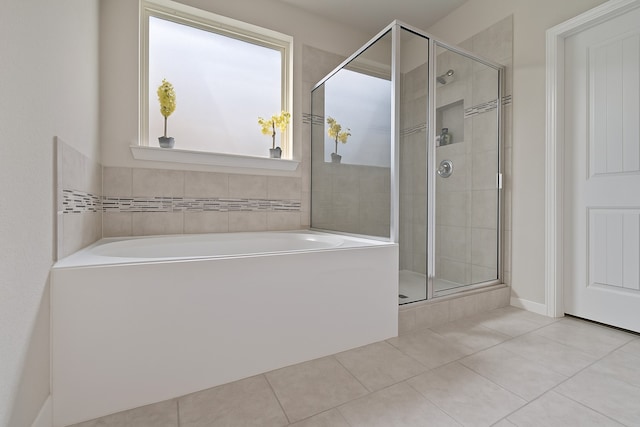 28746 Pearl Bridge Ln, Katy, TX 77494 - full bathroom featuring a shower stall, a garden tub, and tile patterned floors