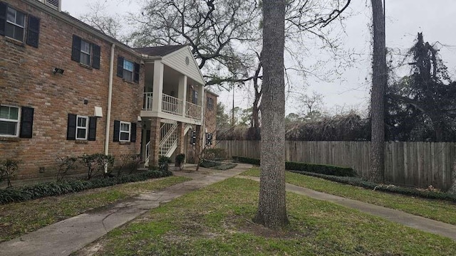 881 Wax Myrtle Ln Unit A, Houston, TX 77079 - view of yard with stairway