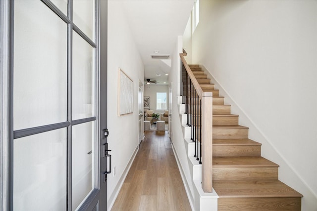 5256 Texas St, Houston, TX 77011 - staircase with wood finished floors
