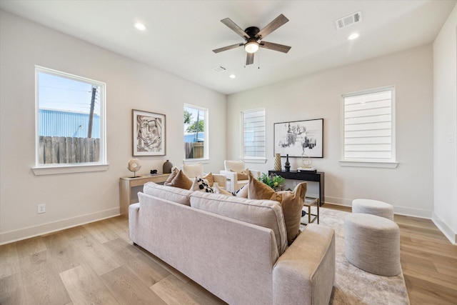 5256 Texas St, Houston, TX 77011 - living room with light wood-style flooring, ceiling fan, and recessed lighting