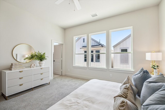 5256 Texas St, Houston, TX 77011 - bedroom featuring light colored carpet and ceiling fan