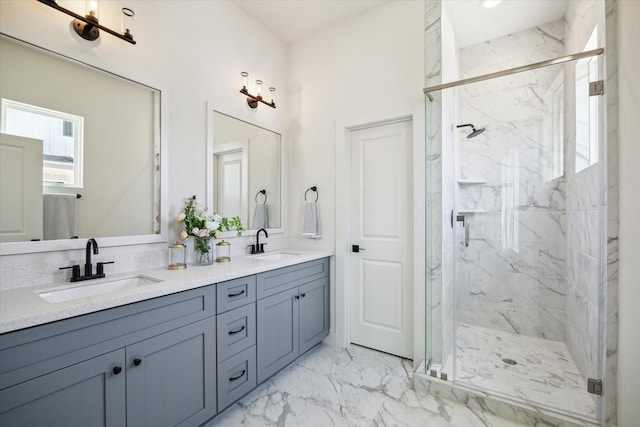 5256 Texas St, Houston, TX 77011 - full bathroom with marble look tiles, a marble finish shower, and double vanity