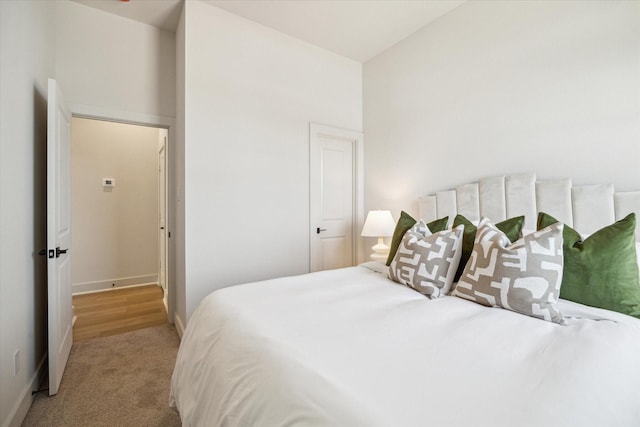 5256 Texas St, Houston, TX 77011 - bedroom featuring light carpet and baseboards