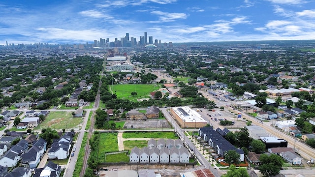 5256 Texas St, Houston, TX 77011 - aerial view of property and surrounding area featuring skyline