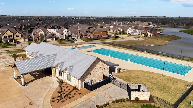 6222 Pelican Ridge Way, League City, TX 77573 - view of swimming pool with a residential view and a water view