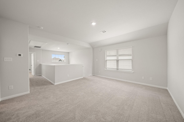 13200 Musky Dr, Conroe, TX 77384 - spare room with attic access, light colored carpet, recessed lighting, and a smoke detector