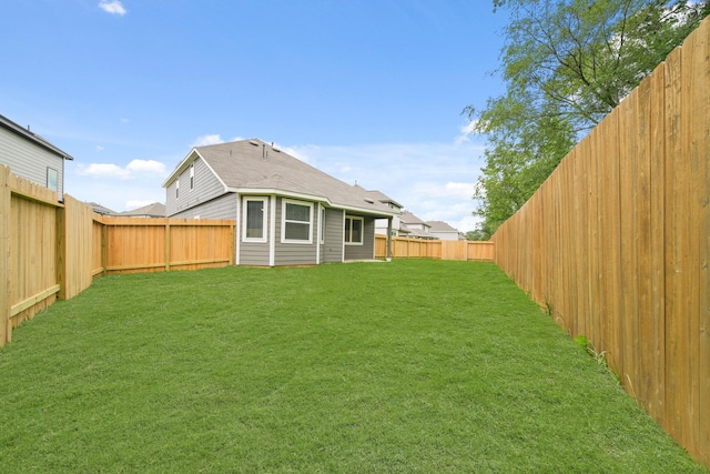 13200 Musky Dr, Conroe, TX 77384 - rear view of property with a fenced backyard