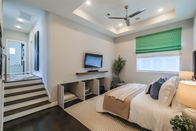 1906 Park St, Houston, TX 77019 - bedroom with wood finished floors, recessed lighting, a raised ceiling, and a ceiling fan