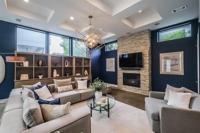 1906 Park St, Houston, TX 77019 - living room with healthy amount of natural light, a chandelier, a fireplace, recessed lighting, and a towering ceiling