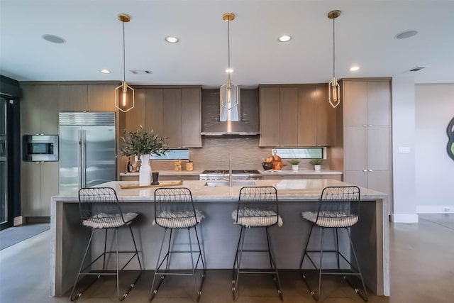 1906 Park St, Houston, TX 77019 - kitchen with built in appliances, wall chimney exhaust hood, modern cabinets, recessed lighting, and finished concrete flooring