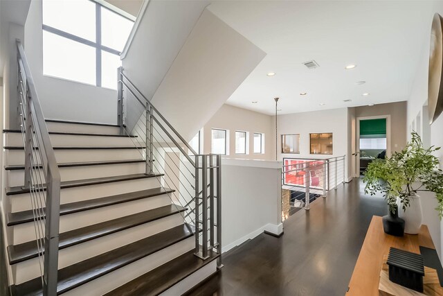 1906 Park St, Houston, TX 77019 - stairs featuring recessed lighting and wood finished floors