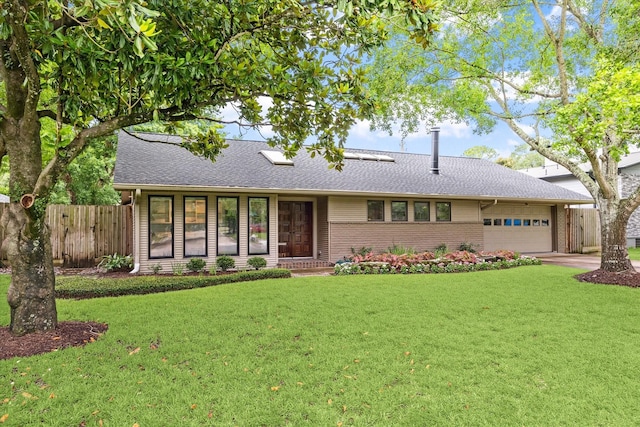 5171 Jason St, Houston, TX 77096 - view of front facade with a garage, brick siding, a shingled roof, and concrete driveway