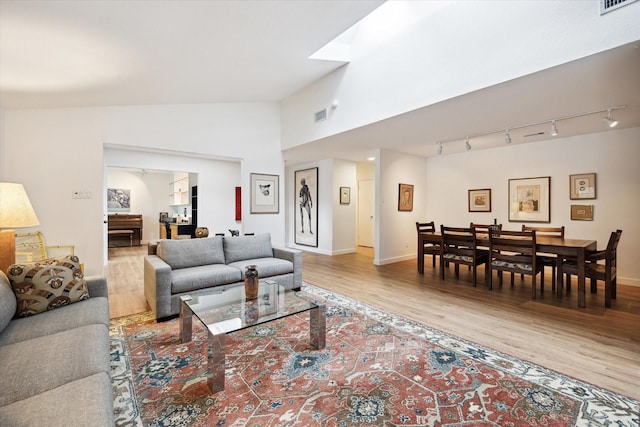 5171 Jason St, Houston, TX 77096 - living area featuring wood finished floors and baseboards