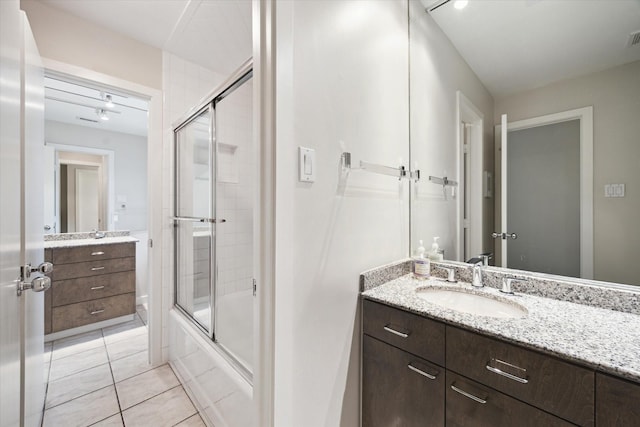 5171 Jason St, Houston, TX 77096 - full bathroom with vanity, combined bath / shower with glass door, and tile patterned floors
