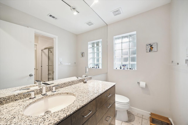 5171 Jason St, Houston, TX 77096 - bathroom featuring vanity, tile patterned flooring, and a stall shower