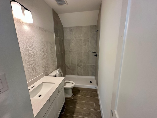 13085 Brookwood Bend Ln, Conroe, TX 77302 - bathroom with tiled shower and vanity