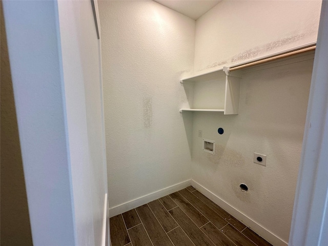13085 Brookwood Bend Ln, Conroe, TX 77302 - laundry room with hookup for an electric dryer, dark wood-type flooring, and washer hookup