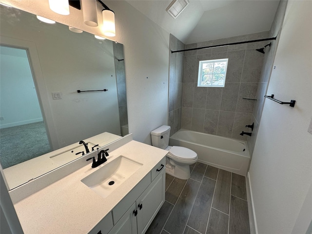 13085 Brookwood Bend Ln, Conroe, TX 77302 - bathroom with vanity, shower / bath combination, wood finished floors, and vaulted ceiling