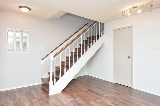 3100 Jeanetta St Unit 1402, Houston, TX 77063 - stairs with wood finished floors and a textured ceiling
