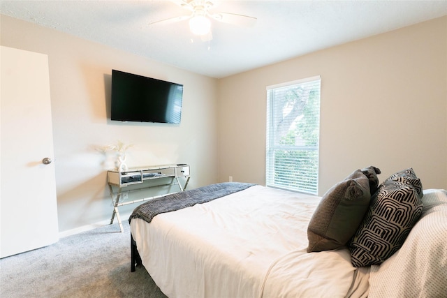 9106 Gustine Ln, Houston, TX 77031 - carpeted bedroom featuring baseboards and a ceiling fan