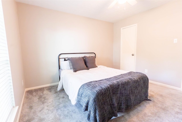 9106 Gustine Ln, Houston, TX 77031 - carpeted bedroom with baseboards and a ceiling fan