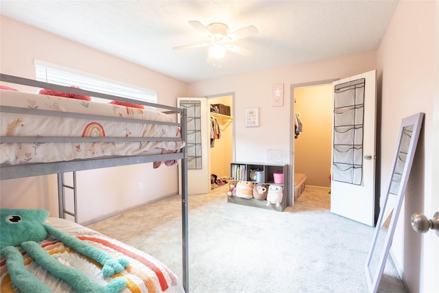 9106 Gustine Ln, Houston, TX 77031 - bedroom featuring carpet flooring, a spacious closet, a closet, and a ceiling fan