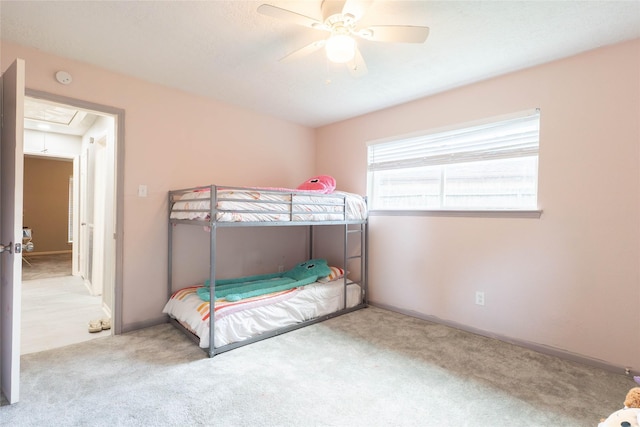 9106 Gustine Ln, Houston, TX 77031 - bedroom with attic access, carpet, and a ceiling fan