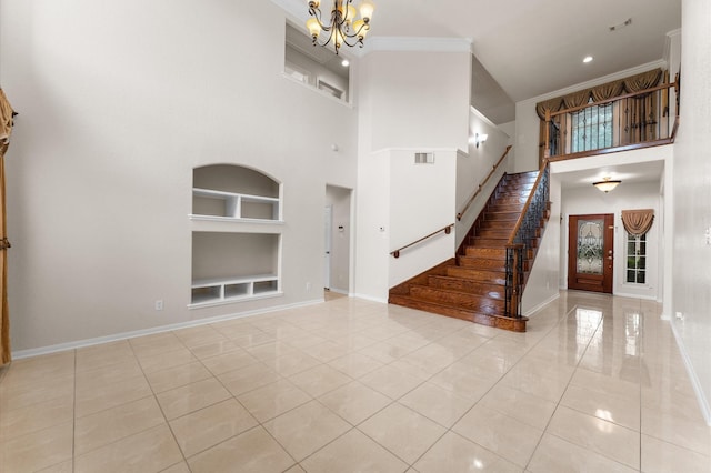 11223 Cactus Valley Ct, Houston, TX 77089 - tiled foyer entrance with a chandelier, a high ceiling, crown molding, stairway, and recessed lighting