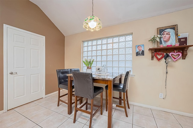 10323 Emerald Pine Dr, Houston, TX 77070 - dining area with lofted ceiling and light tile patterned floors