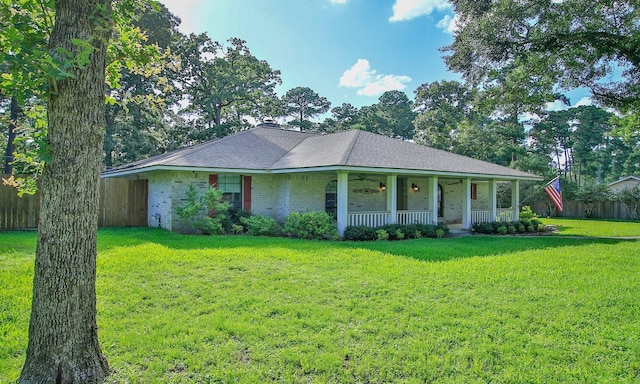 2102 Candy St, Pinehurst, TX 77362 - view of front of property featuring a porch, brick siding, and ceiling fan