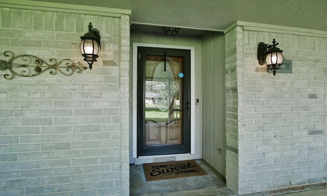 2102 Candy St, Pinehurst, TX 77362 - entrance to property featuring brick siding