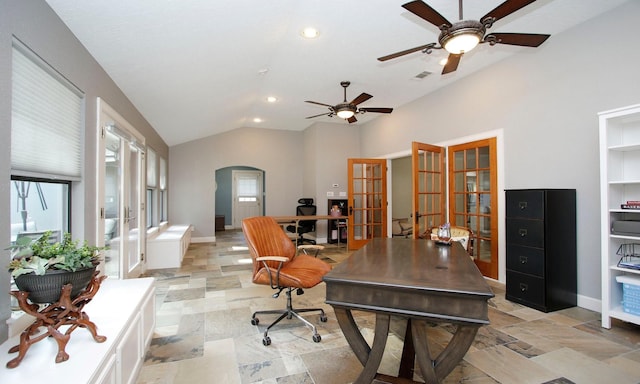 2102 Candy St, Pinehurst, TX 77362 - office with french doors, lofted ceiling, arched walkways, a ceiling fan, and stone tile floors