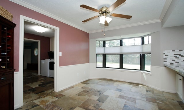 2102 Candy St, Pinehurst, TX 77362 - empty room featuring stone tile flooring, a wainscoted wall, ceiling fan, and ornamental molding