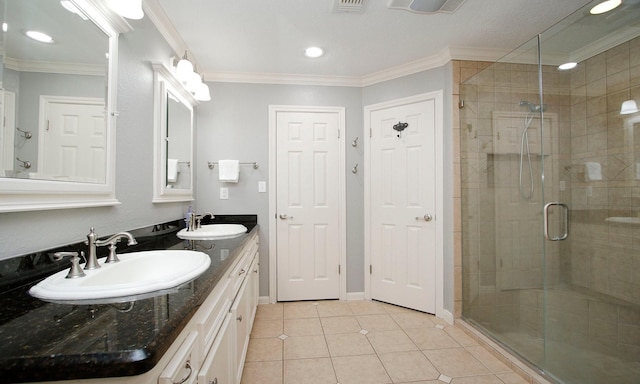 2102 Candy St, Pinehurst, TX 77362 - full bath featuring double vanity, crown molding, a stall shower, tile patterned flooring, and recessed lighting