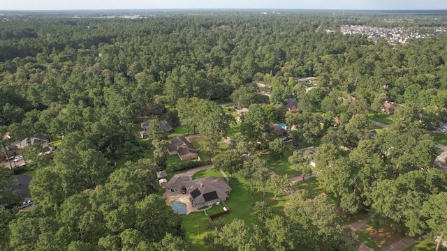 2102 Candy St, Pinehurst, TX 77362 - view of property location featuring a heavily wooded area