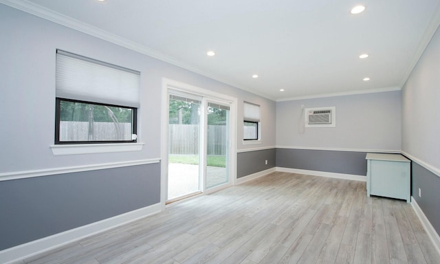2102 Candy St, Pinehurst, TX 77362 - empty room featuring a wall unit AC, recessed lighting, crown molding, and wood finished floors