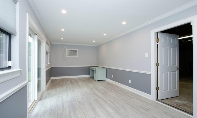 2102 Candy St, Pinehurst, TX 77362 - spare room featuring light wood finished floors, recessed lighting, crown molding, and a wall mounted air conditioner