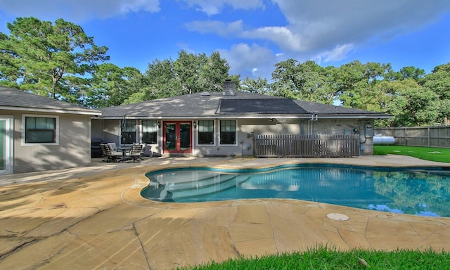 2102 Candy St, Pinehurst, TX 77362 - view of pool with french doors and a patio