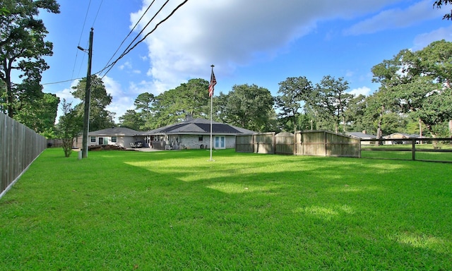 2102 Candy St, Pinehurst, TX 77362 - view of fenced backyard