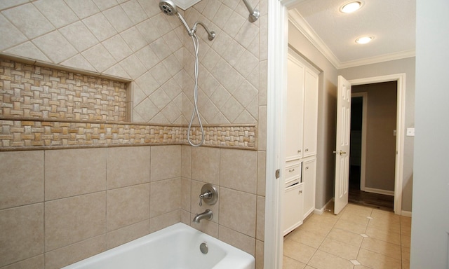 2102 Candy St, Pinehurst, TX 77362 - bathroom with crown molding, washtub / shower combination, tile patterned flooring, and recessed lighting