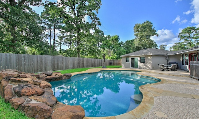 2102 Candy St, Pinehurst, TX 77362 - view of swimming pool with a fenced backyard and a patio