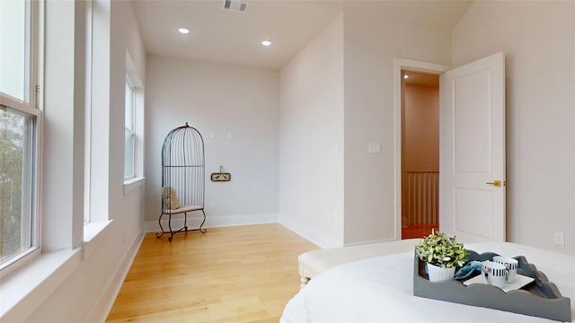 2611 Sherwin St, Houston, TX 77007 - bedroom with light wood finished floors and recessed lighting