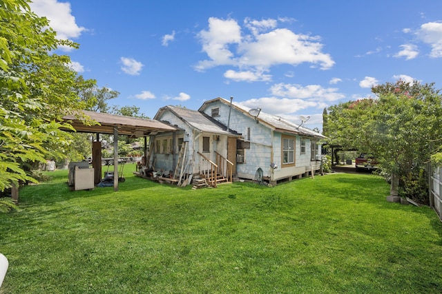 4313 Rogers St, Houston, TX 77022 - back of house featuring a lawn and entry steps