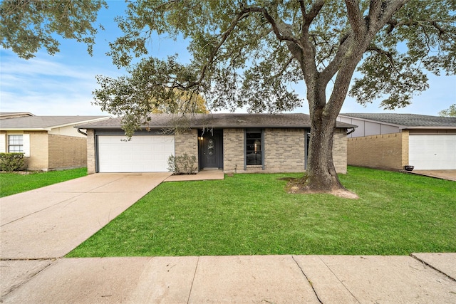 4406 Kacee Dr, Houston, TX 77084 - mid-century modern home with brick siding, driveway, a front lawn, and a garage