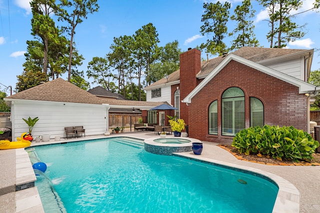 12927 Finch Brook Dr, Cypress, TX 77429 - view of pool with a patio area and a pool with connected hot tub