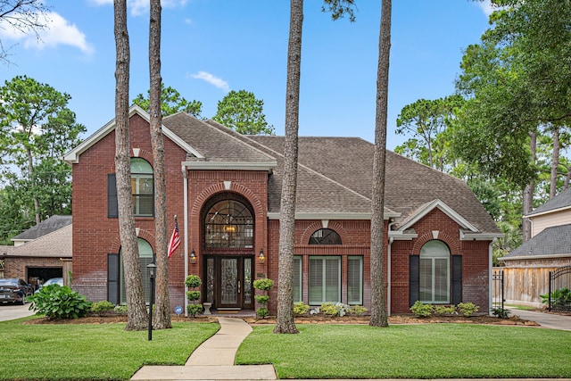 12927 Finch Brook Dr, Cypress, TX 77429 - view of front facade featuring brick siding and a shingled roof